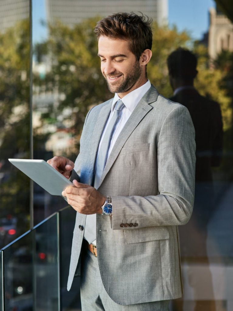 A Smiley Face Man Working In His Tab
